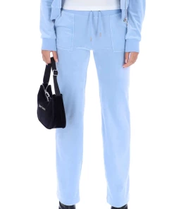JUICY COUTURE POWDER BLUE CLASSIC VELOUR DEL RAY POCKETED BOTTOMS SPRING SUMMER'22 COLLECTION