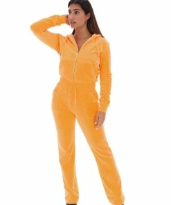 JUICY COUTURE BLAZING ORANGE CLASSIC VELOUR DEL RAY POCKETED BOTTOMS
