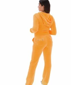 JUICY COUTURE BLAZING ORANGE CLASSIC VELOUR DEL RAY POCKETED BOTTOMS