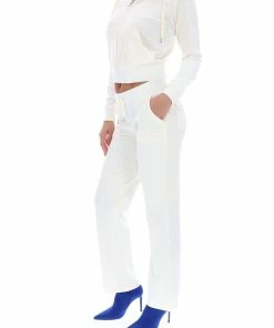 JUICY COUTURE CREAM CLASSIC VELOUR DEL RAY POCKETED BOTTOMS SPRING SUMMER'22 COLLECTION